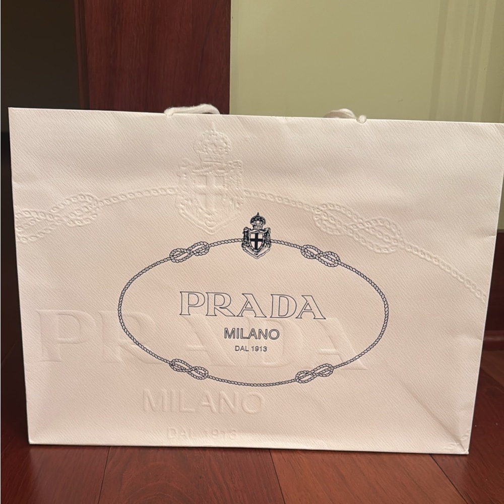 White Prada shopping bag